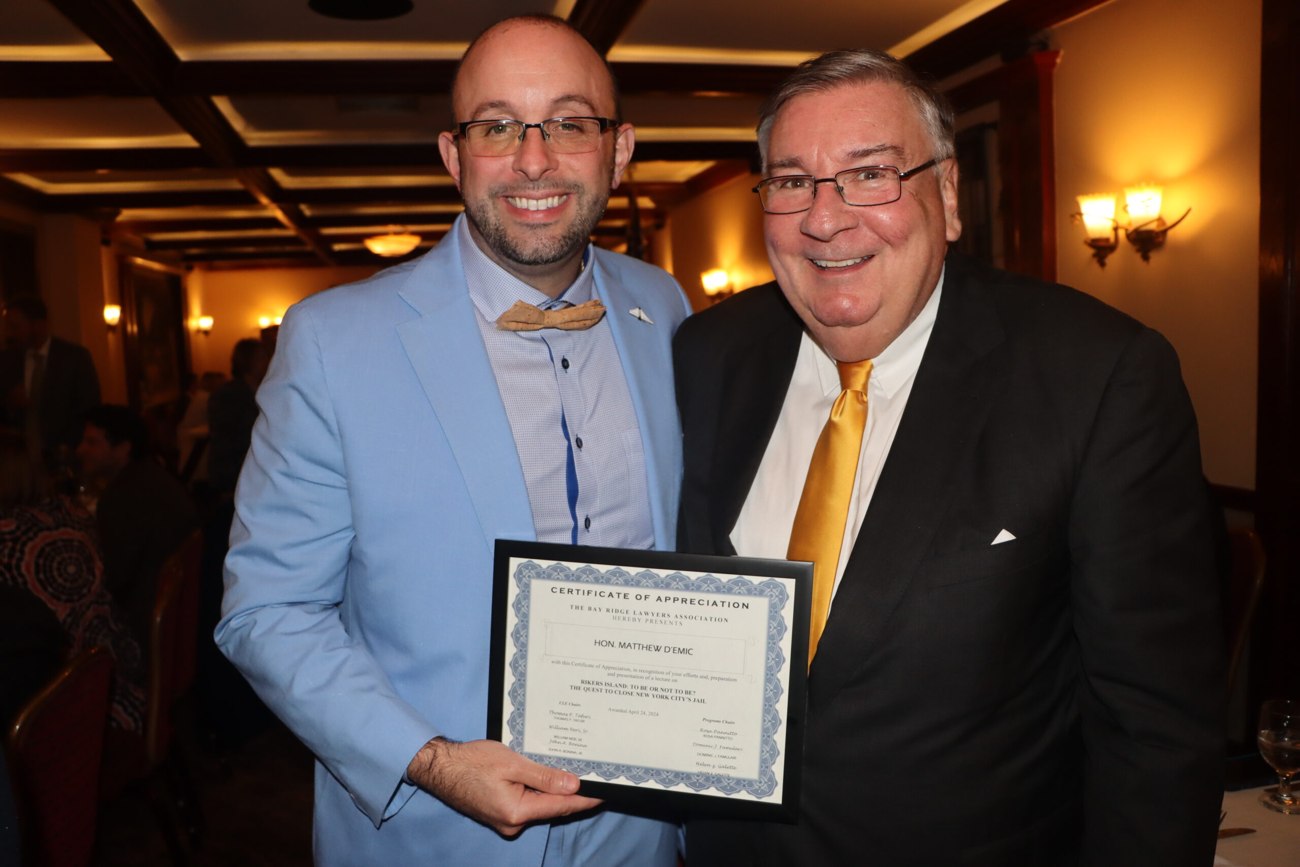 BRLA President Adam Kalish presents Hon. Matthew D'Emic with a certificate of appreciation for his insightful lecture on the future of Rikers Island at the Bay Ridge Lawyers Association meeting in Brooklyn. Brooklyn Eagle photos by Mario Belluomo
