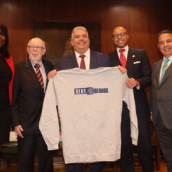 At the Brooklyn Bar Association's annual meeting, District Attorney Eric Gonzalez proudly displays a “Blue Bloods” shirt, a gift from past president David Chidekel. Pictured from left to right: Joy Thompson, David Chidekel, DA Gonzalez, incoming president Anthony Vaughn Jr. and outgoing president Joseph Rosato. Brooklyn Eagle photos by Mario Belluomo