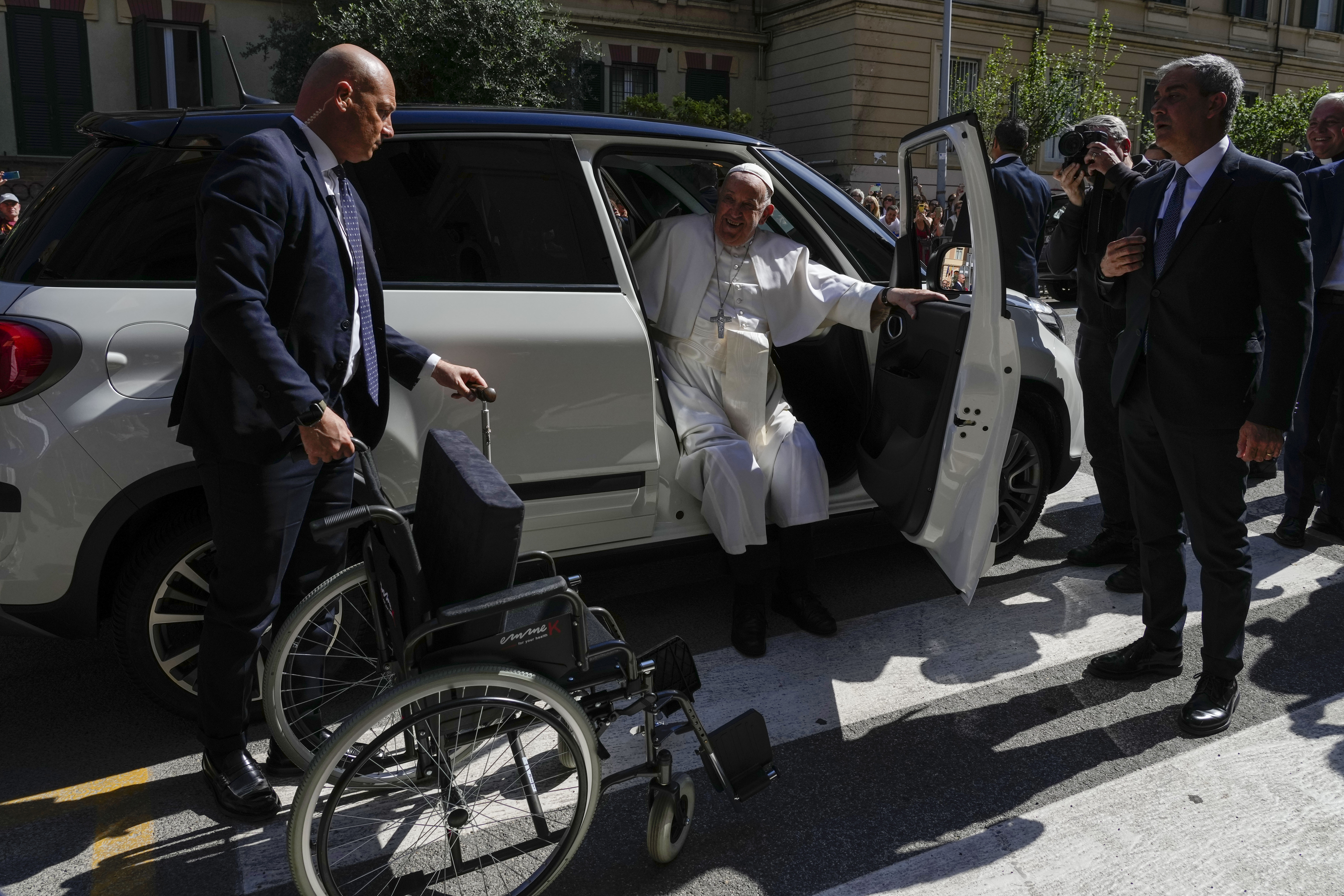 Pope Francis gets out of a car as he arrives to a meeting with elderly priests at the San Giuseppe al Trionfale Parish Church in Rome, Tuesday, May 14, 2024. (AP Photo/Alessandra Tarantino)