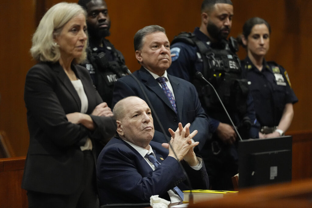 Harvey Weinstein appears in Queens criminal court, with his attorneys, Diana Fabi Samson, left, and John Esposito, Thursday, May 9, 2024, in New York. Harvey Weinstein returned to court in New York City as authorities consider an extradition request from California to serve his sentence for a 2022 rape conviction. The 16-year sentence Weinstein received for raping a woman at a Los Angeles film festival in 2013 had been on ice while he served time in New York. (AP Photo/Julia Nikhinson)