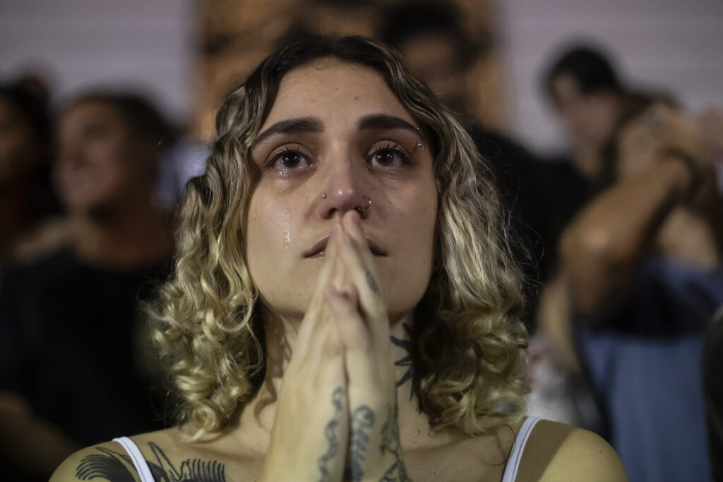 Kimberly Nobille, 26, cries during a protest against an anti-abortion bill in Brazil's Congress, in Rio de Janeiro, Thursday, June 13, 2024. (AP Photo/Bruna Prado)