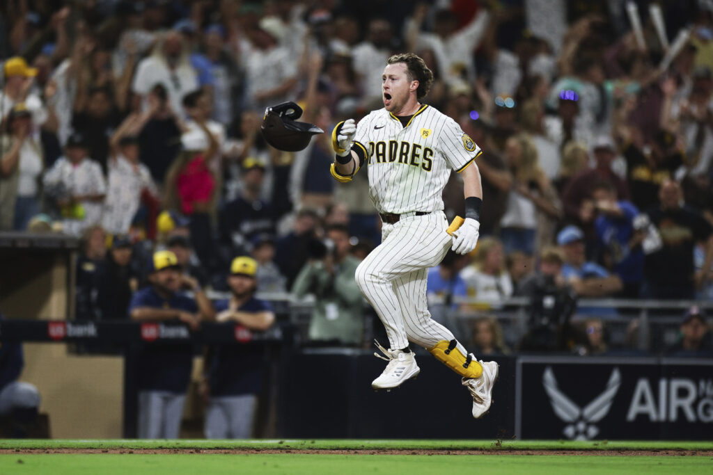 San Diego Padres' Jake Cronenworth celebrates as he nears home after hitting a game-winning solo home run against the Milwaukee Brewers during the ninth inning of a baseball game Thursday, June 20, 2024, in San Diego. (AP Photo/Derrick Tuskan)