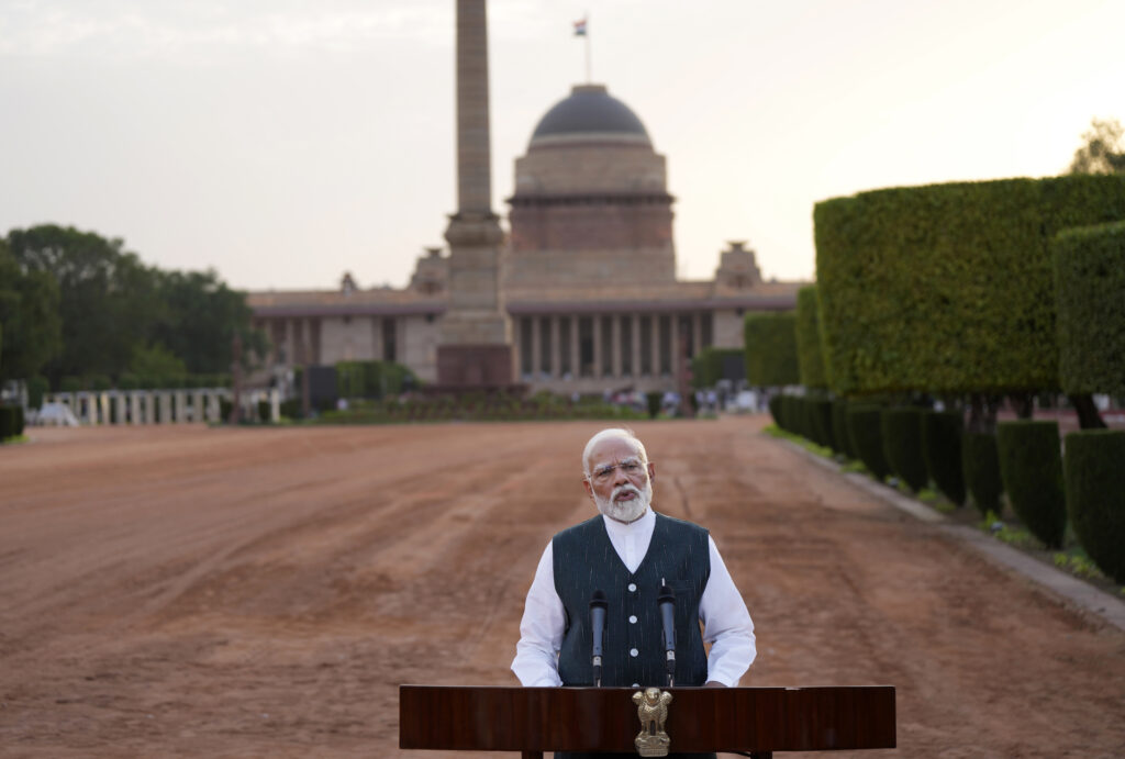 Indian Prime Minister Narendra Modi speaks to the media outside the Rashtrapati Bhavan after receiving a letter from the President of India, Draupadi Murmu, inviting him to form the next central government, in New Delhi, India, Friday, June 7, 2024. (AP Photo/Manish Swarup)