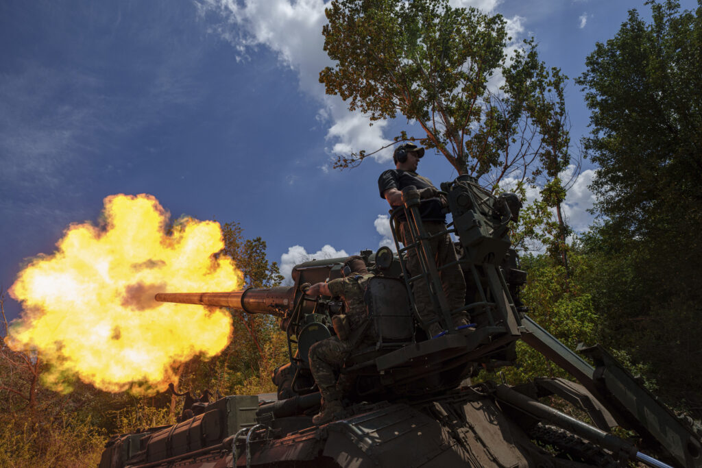 Ukrainian soldiers, of 43rd artillery brigade, fire by 2s7 self-propelled howitzer towards Russian positions at the frontline in Donetsk region, Ukraine, Monday, June 24, 2024. (AP Photo/Evgeniy Maloletka)