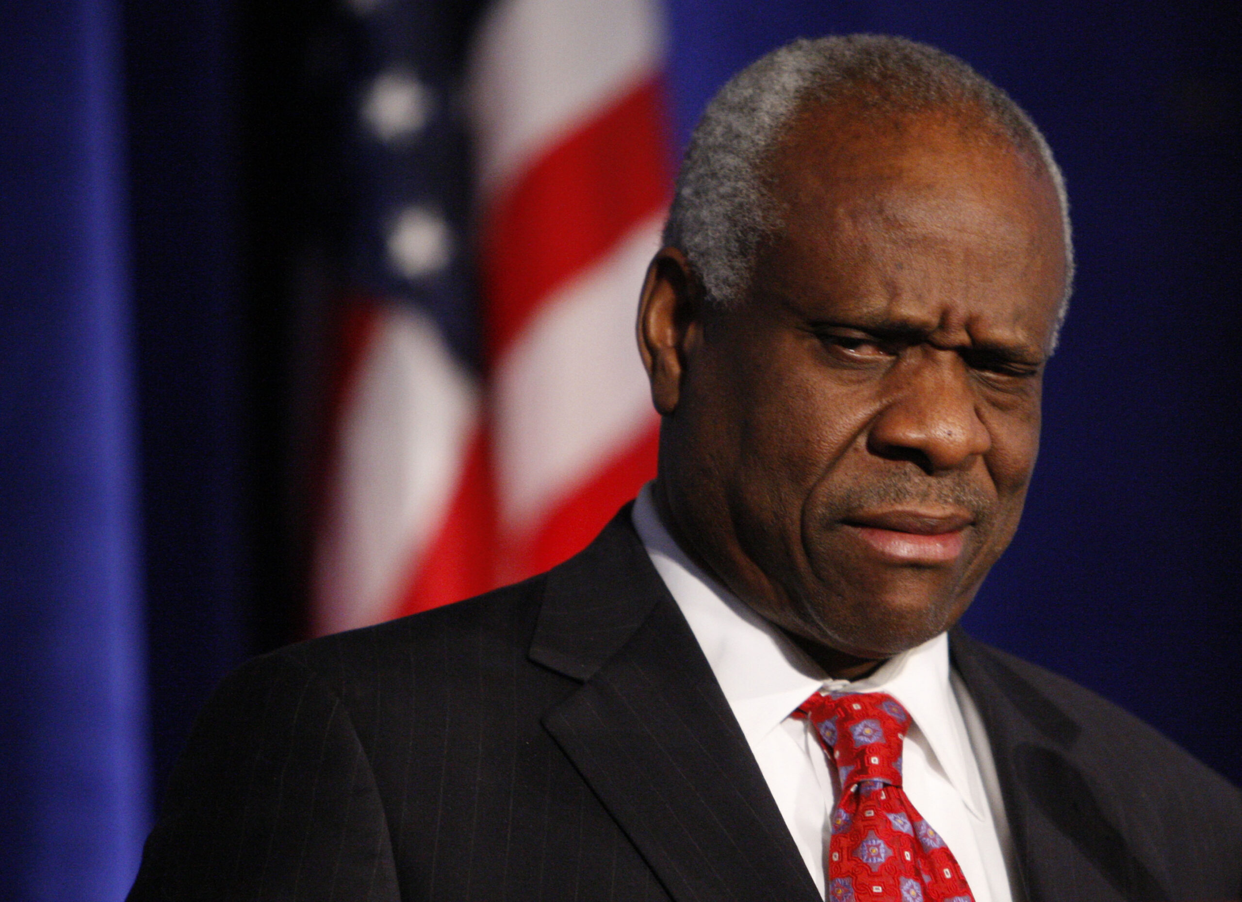 Supreme Court Justice Clarence Thomas has faced scrutiny over undisclosed luxury trips and gifts from billionaire Harlan Crow, sparking ethical concerns and calls for reform. Photo: Charles Dharapak/AP