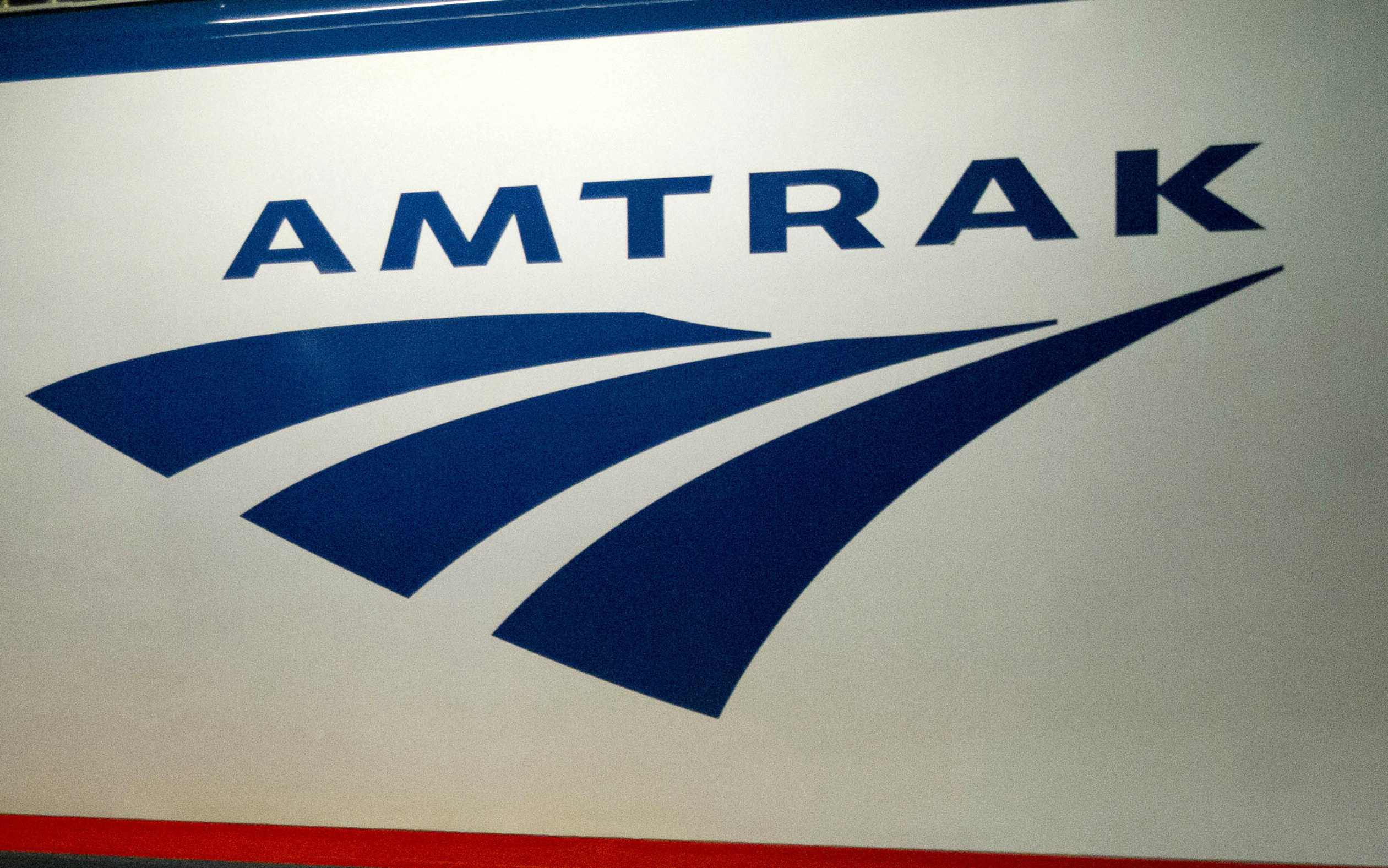 An Amtrak logo is seen on a train at 30th Street Station in Philadelphia. AP Photo/Matt Rourke, File