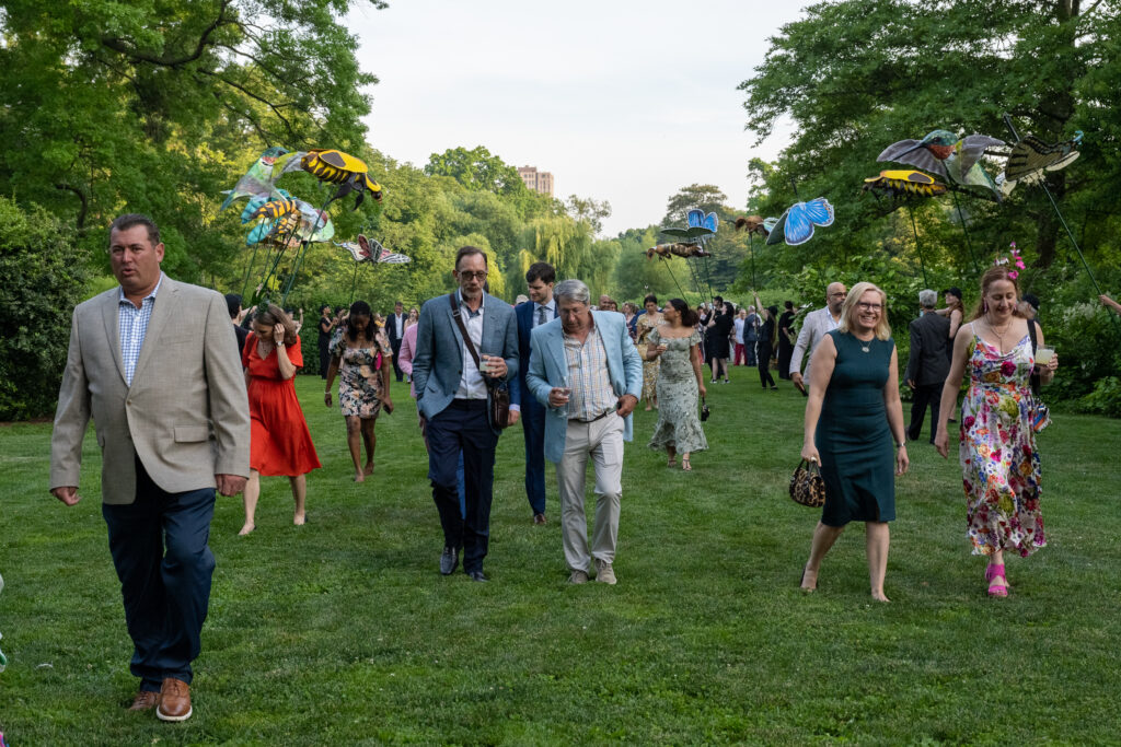 Guests make their way from the Plant Family Collection Lawn to the Cherry Esplanade. Photo: Gabriele Holtermann/Brooklyn Eagle