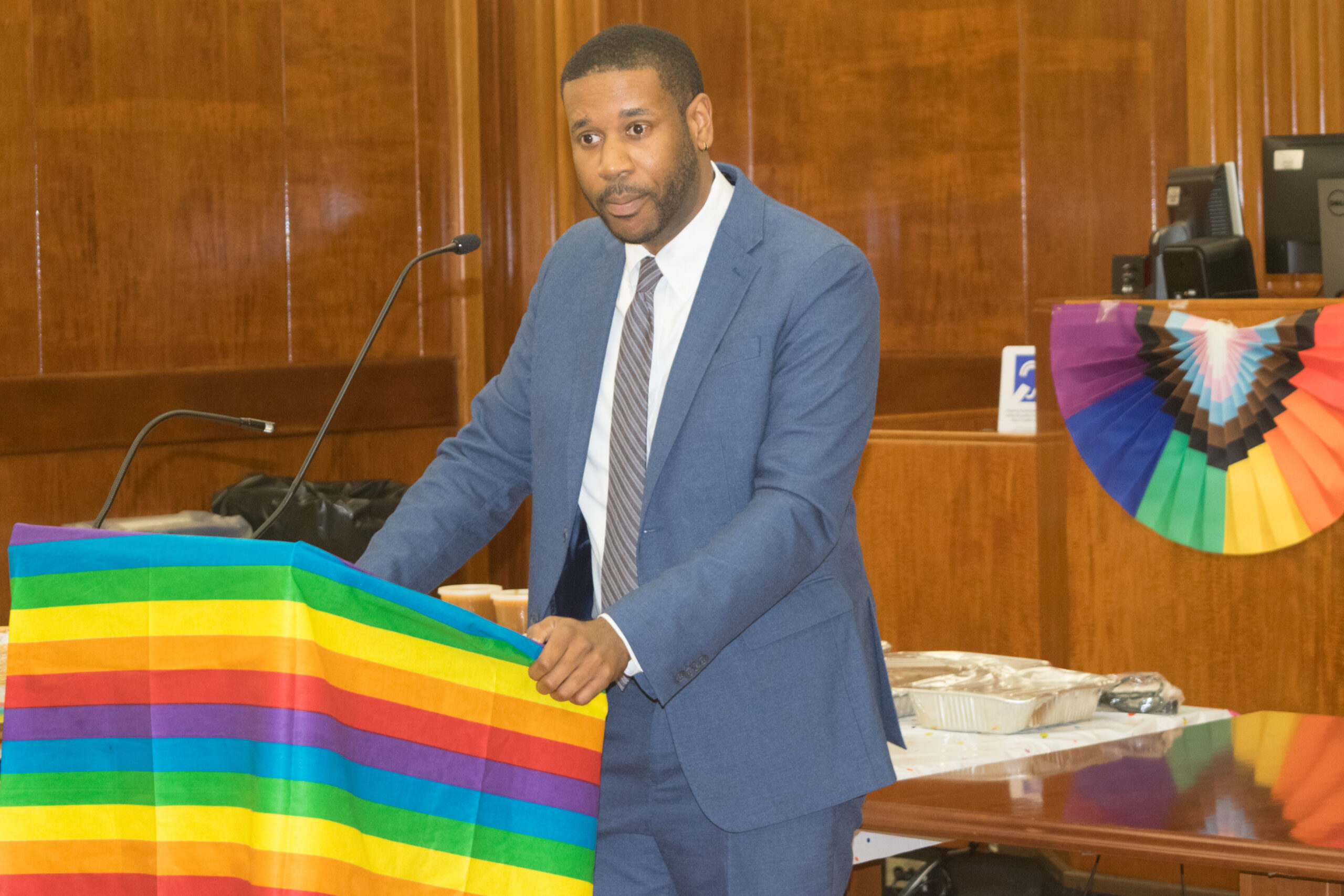Omari Scott, director of the Brooklyn Community Pride Center, speaks about the center's mission and impact during the Pride Month Celebration.