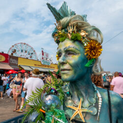 Photographer Eva Meuller poses on the boardwalk after the 42nd Annual Mermaid Parade. Photos by Beth Eisgrau-Heller