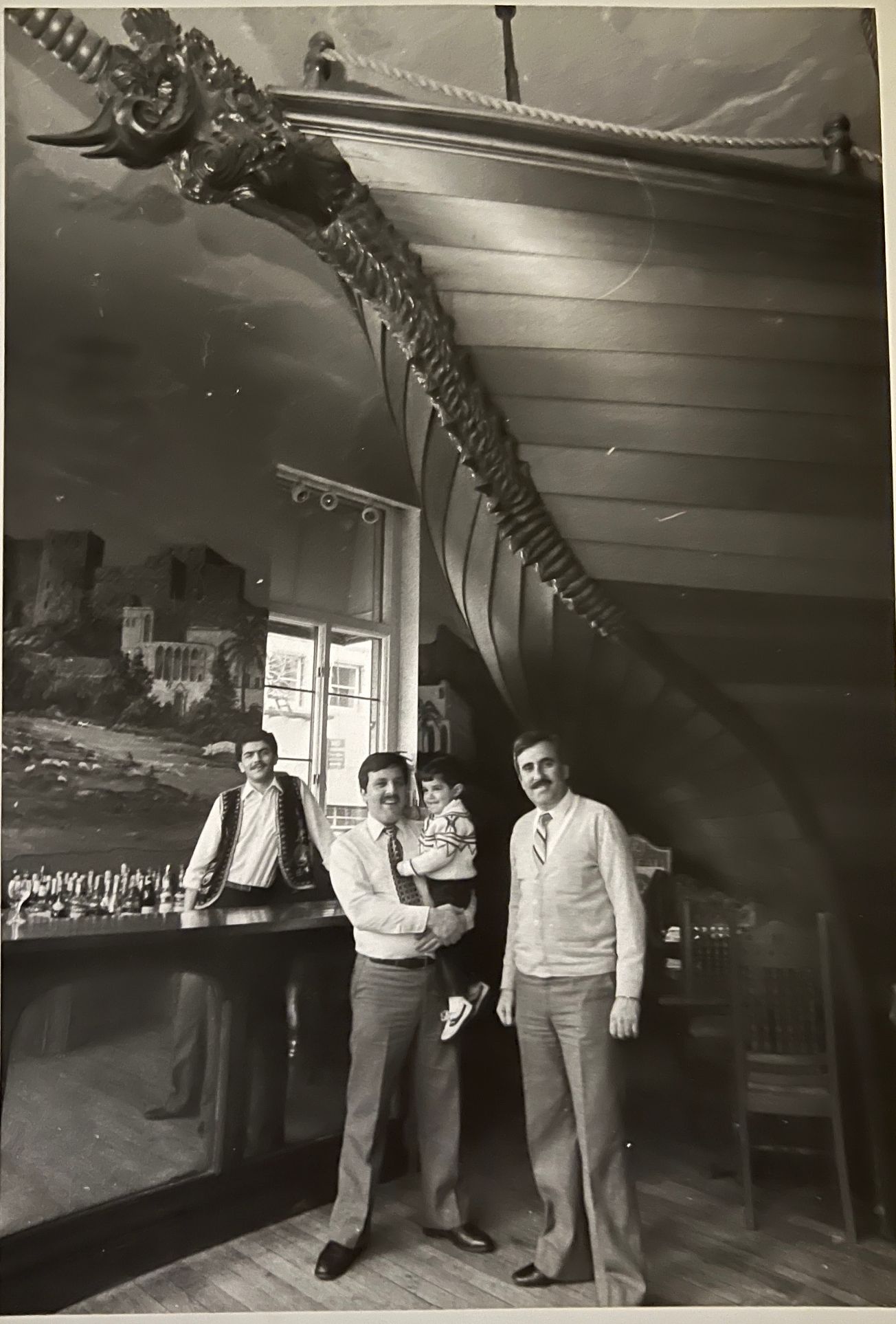 Owner Mohamad Salem and family inside the restaurant, which had an exuberant nautical theme, circa 1970s.