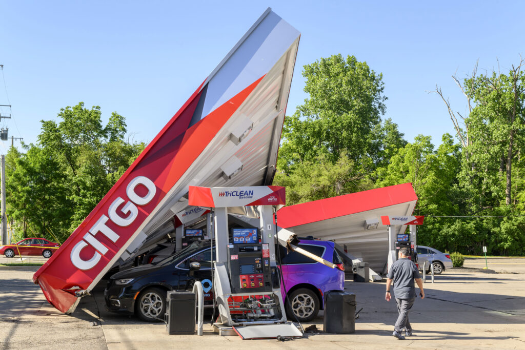 Powerful storms the night before left a gas station heavily damaged on West Ten Mile Road, in Farmington Hills, Mich., June 6, 2024. (David Guralnick/Detroit News via AP)