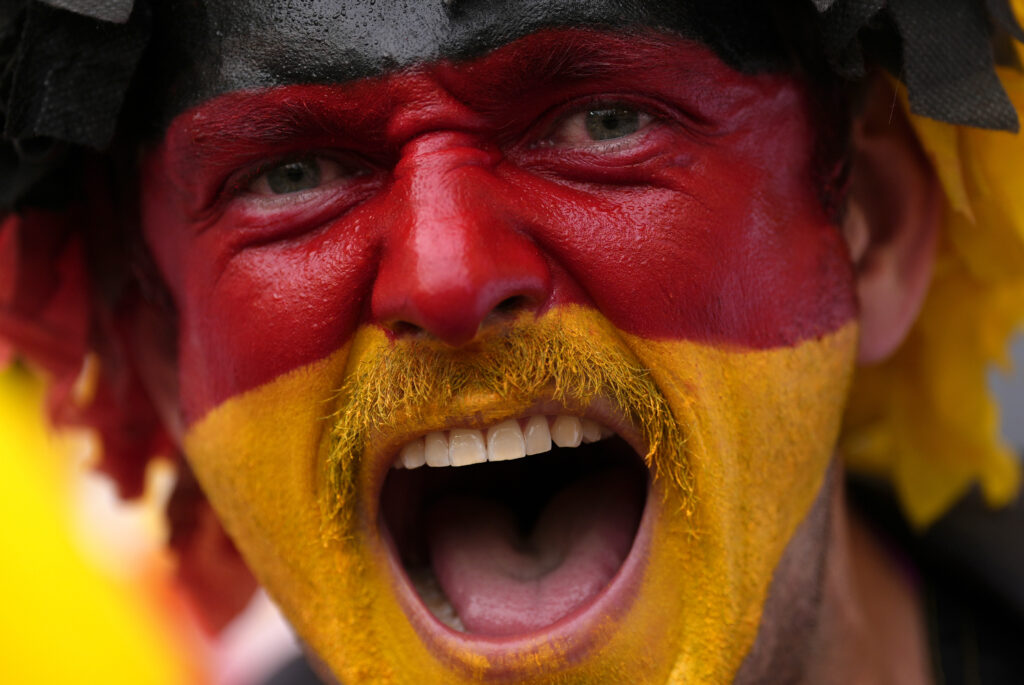 A soccer fan cheer for the German team prior to a quarter final match between Germany and Spain at the Euro 2024 soccer tournament in Stuttgart, Germany, Friday, July 5, 2024. (AP Photo/Ariel Schalit)