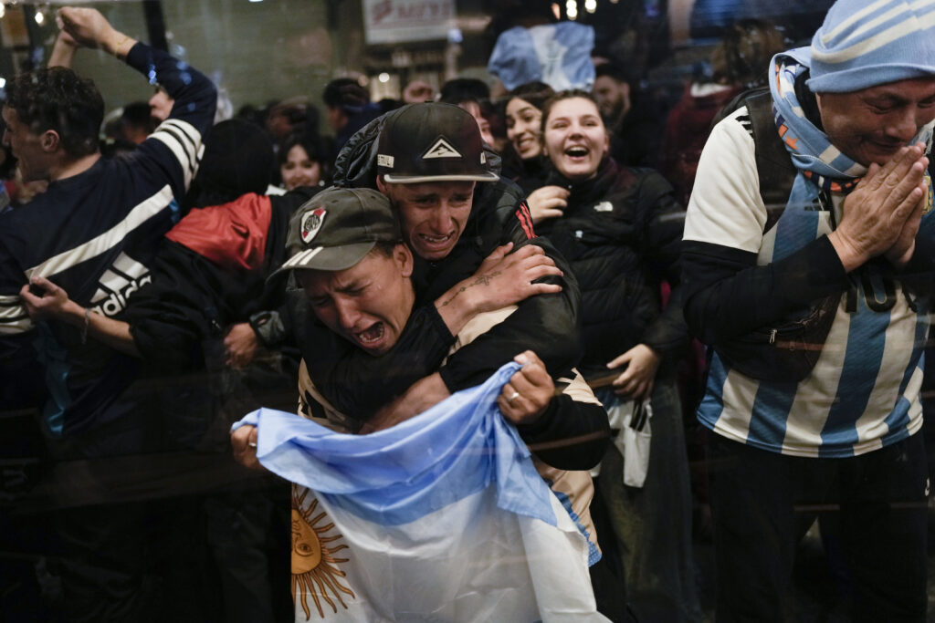 Argentina fans react after their team defeated Colombia at the Copa America final soccer match in Buenos Aires, Argentina, Monday, July 15, 2024. (AP Photo/Rodrigo Abd)