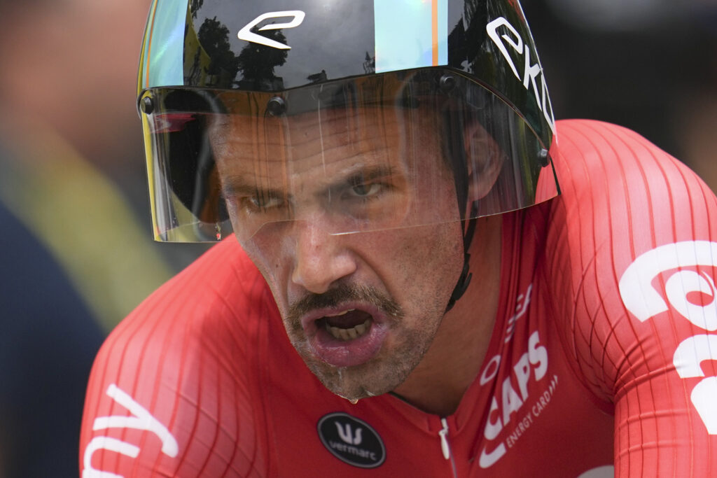 Belgium's Victor Campenaerts strains during the seventh stage of the Tour de France cycling race, an individual time-trial over 25.3 kilometers (15.7 miles) with start Nuits-Saint-Georges and finish in Gevrey-Chambertin, France, Friday, July 5, 2024. (AP Photo/Daniel Cole)