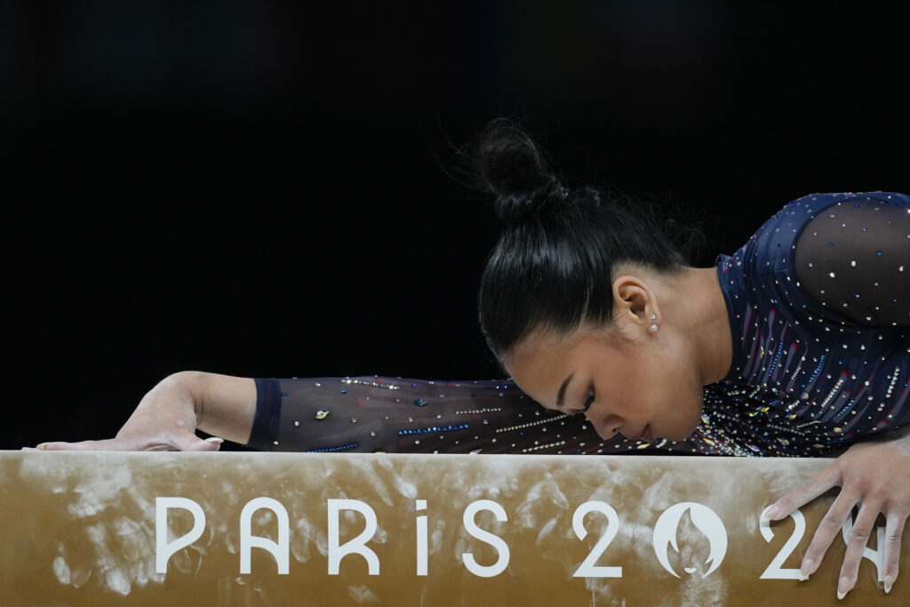Suni Lee of the United States practices during a gymnastics training session at Bercy Arena at the 2024 Summer Olympics, Thursday, July 25, 2024, in Paris, France. (AP Photo/Abbie Parr)