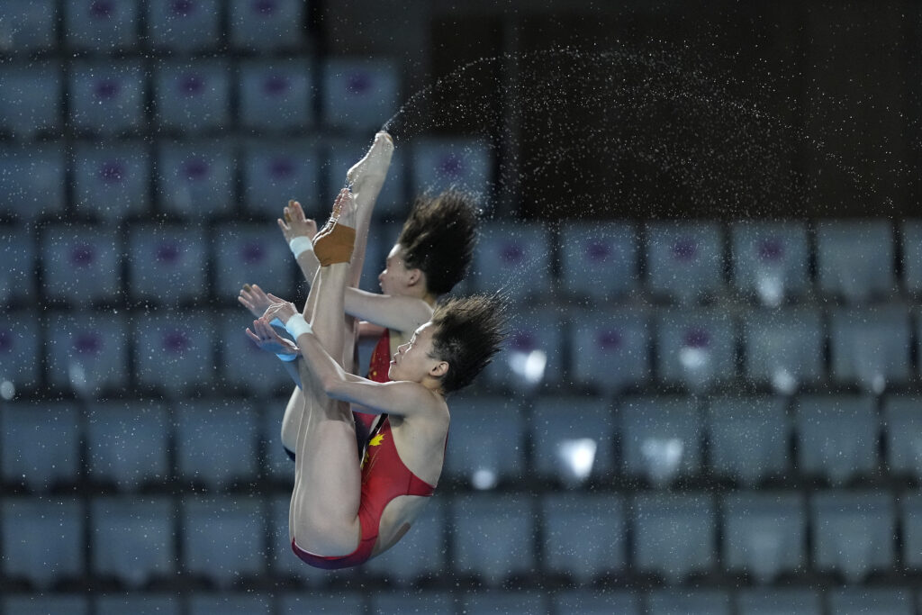 China's Chen Yuxi and Quan Hongchan take part in a diving training session, at the Olympic Aquatics Centre ahead of the 2024 Summer Olympics, Thursday, July 25, 2024, in Saint-Denis, France. (AP Photo/Lee Jin-man)