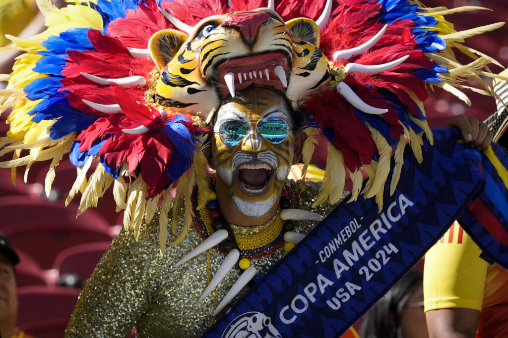 A fan for Colombia yells in the stands before a Copa America Group D soccer match against Brazil, Tuesday, July 2, 2024, in Santa Clara, Calif. (AP Photo/Godofredo A. Vásquez)