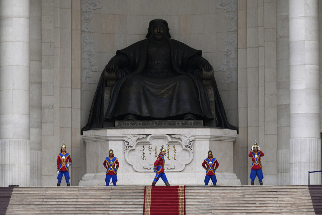 Mongolian honor guards prepare for a ceremony marking the first session of the newly elected Parliament in front of the Government Palace on Sukhbaatar Square in Ulaanbaatar, Mongolia, Tuesday, July 2, 2024. (AP Photo/Ng Han Guan)