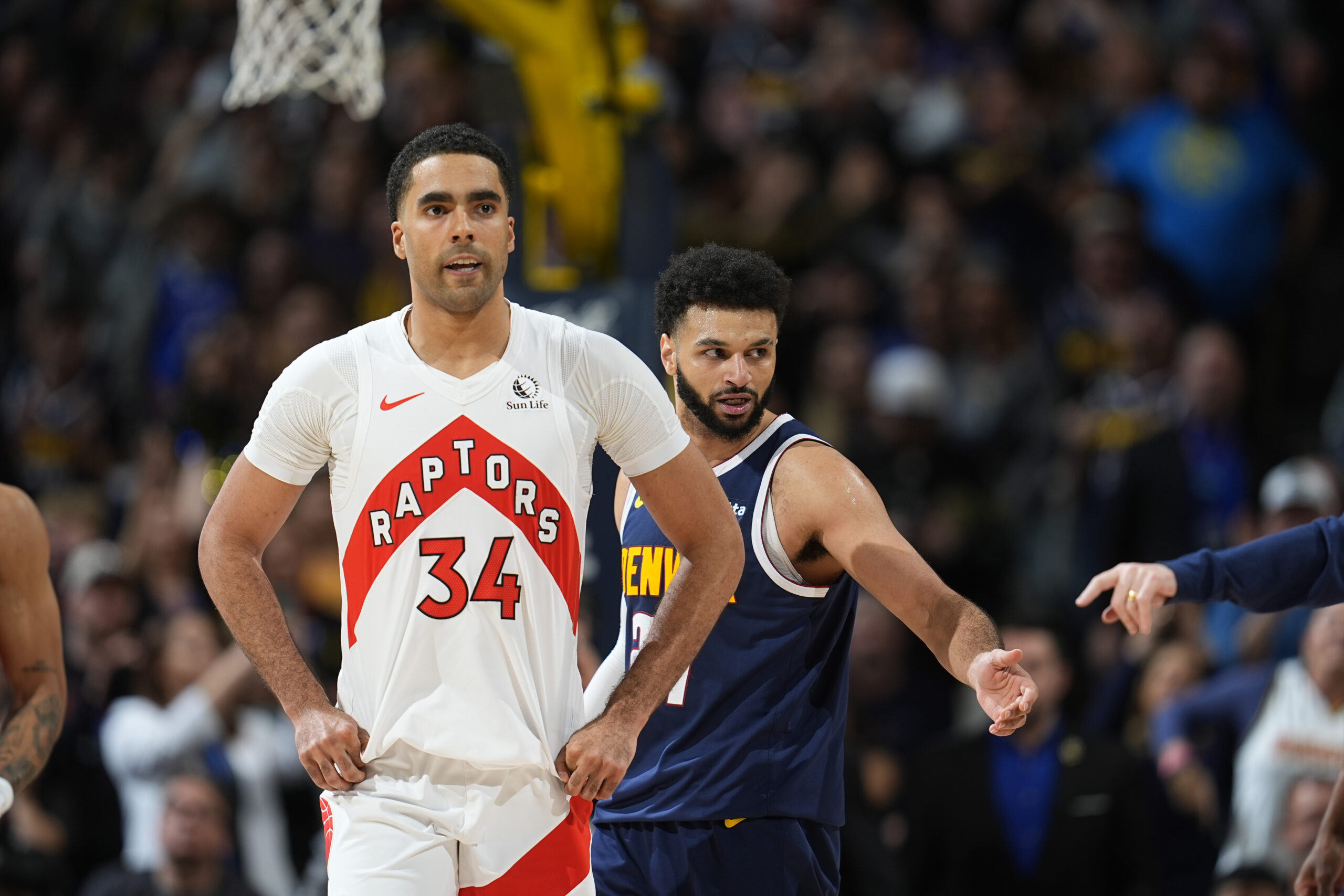 Toronto Raptors center Jontay Porter is bound by the original terms of his release, which includes remaining in the United States. Photo: David Zalubowski/AP