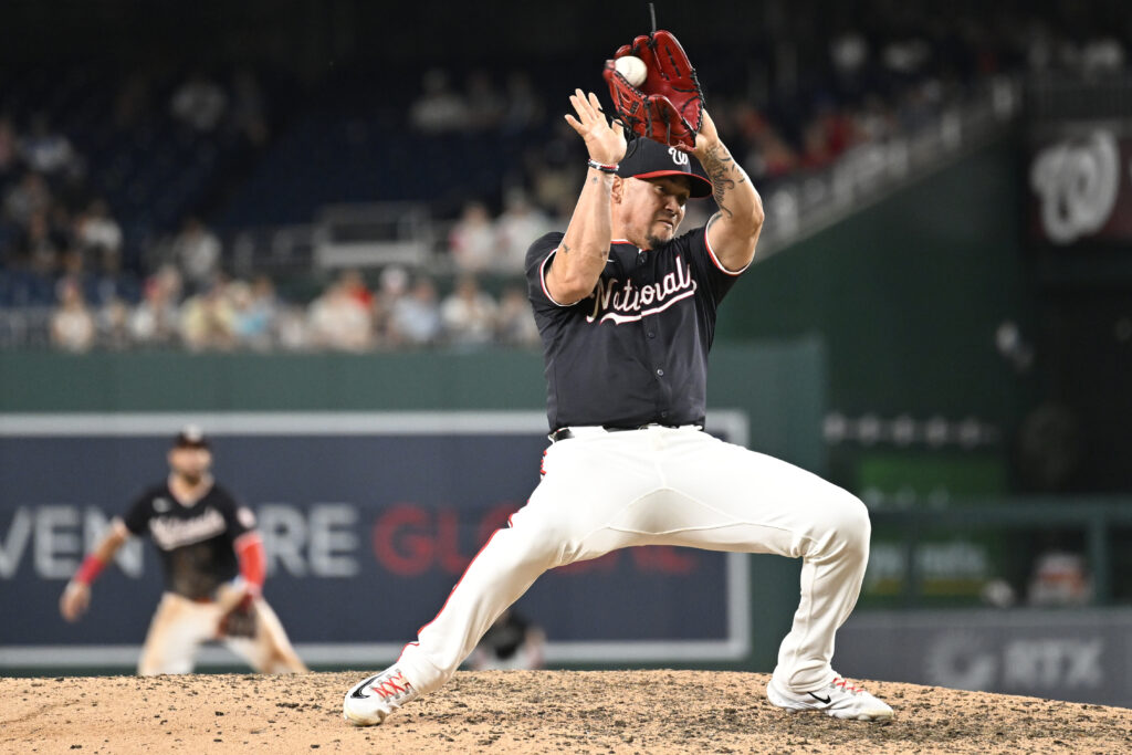 Washington Nationals infielder turned closing pitcher Ildemaro Vargas catches a line drive hit by San Diego Padres' Jake Cronenworth for the third out of the top of the ninth inning of a baseball game, Wednesday, July 24, 2024, in Washington. (AP Photo/John McDonnell)