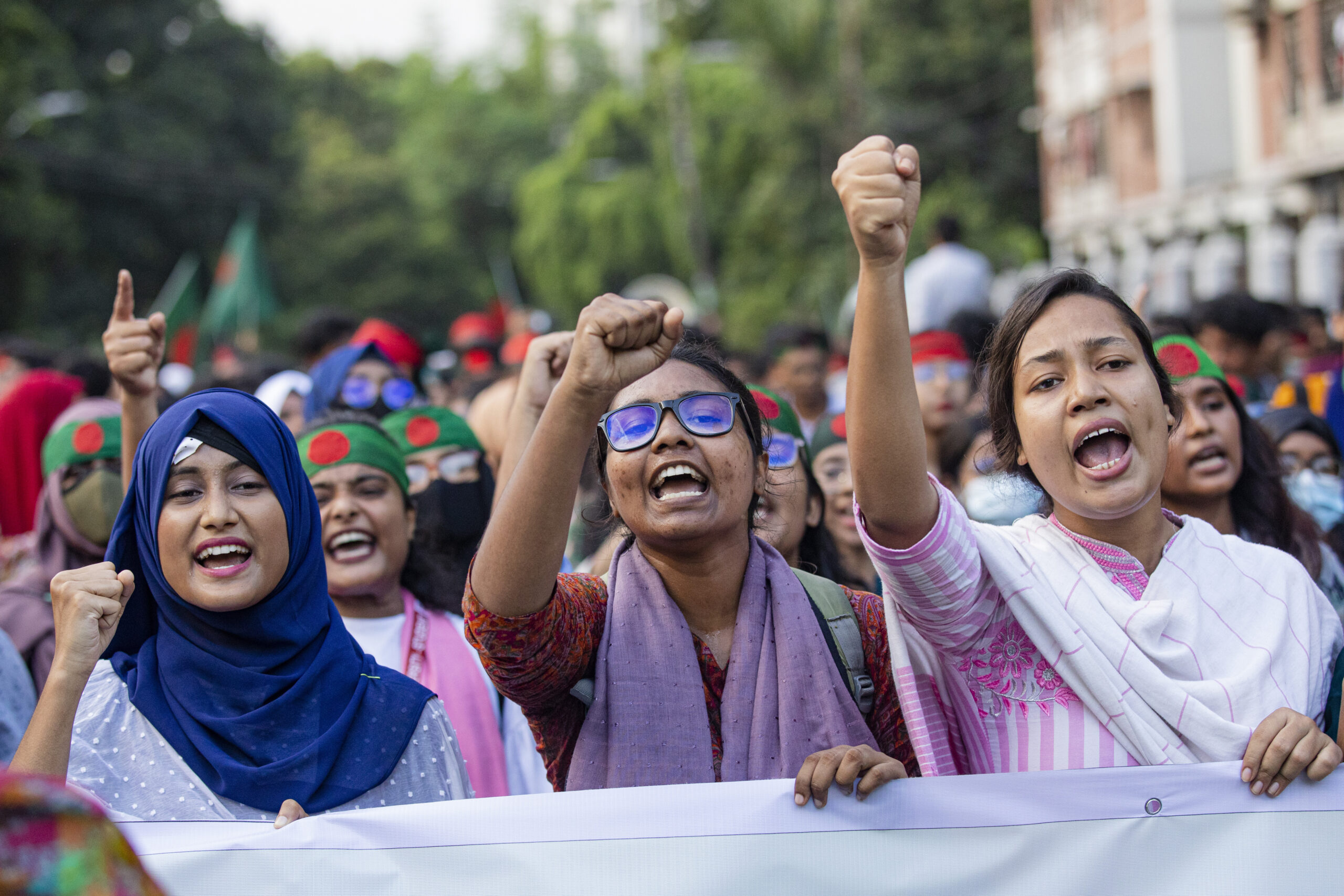 Students shout slogans during a protest demanding the trial of former Prime Minister Sheikh Hasina in Dhaka, Bangladesh, Tuesday, Aug. 13, 2024. (AP Photo/Rajib Dhar)