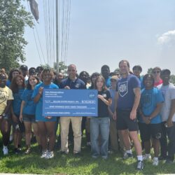 Hakeem Jeffries presents a $963,000 check for the Billion Oyster Project’s restoration of the Paerdegat Oyster Reef. Photo by Wayne Daren Schneiderman