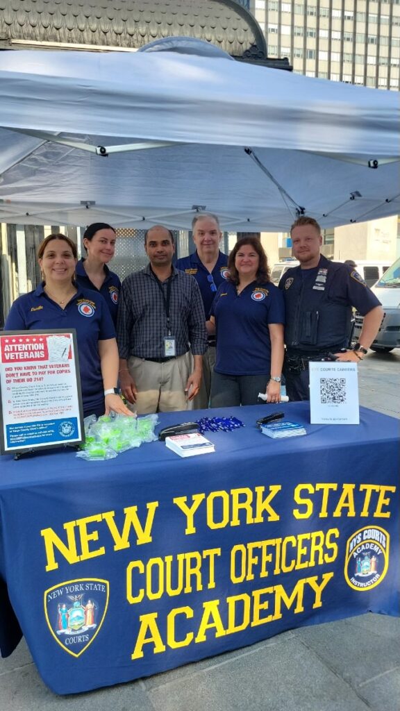 Senior Court Analyst Lissette Morales, alongside colleagues from the Kings County Clerk's Office, engaging with the community at the GrowNYC Farmers Market on August 6, 2024. Photo courtesy of the Kings County Clerk’s Office