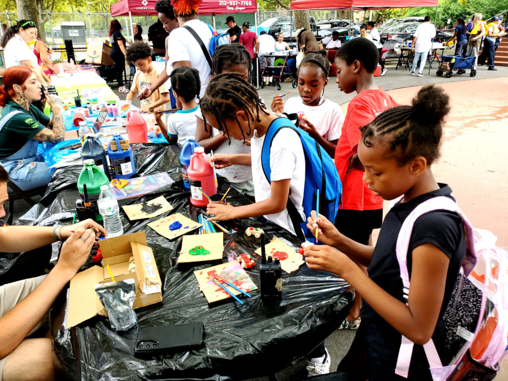 Kids showing off their artistic side. Photo by Arthur De Gaeta