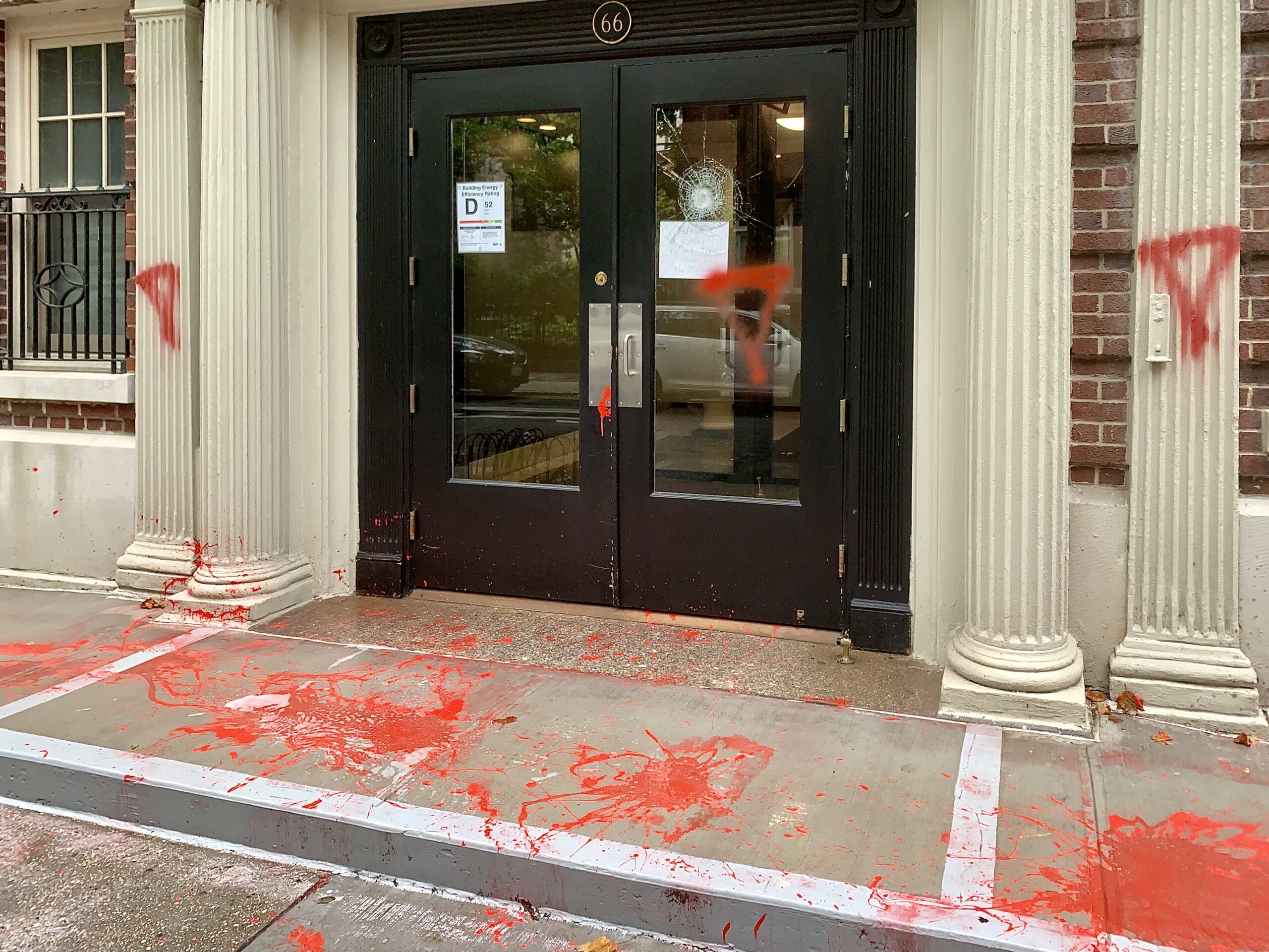 The columns, sidewalk and vestibule of this Orange Street co-op were defaced by pro-Palestinian vandals Thursday. Photo by Mary Frost