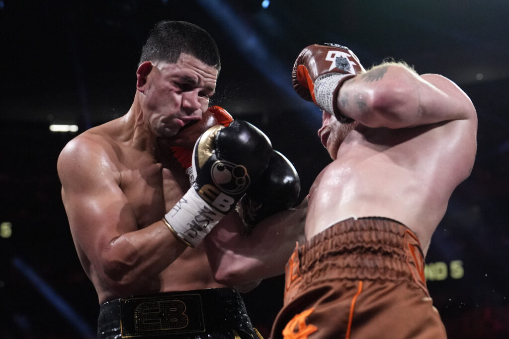 Canelo Alvarez lands a right to Edgar Berlanga in a super middleweight title bout Saturday, Sept. 14, 2024, in Las Vegas. (AP Photo/John Locher)