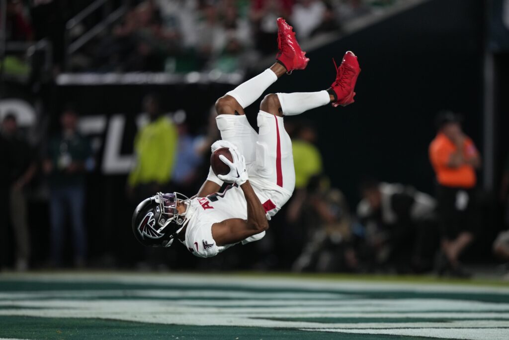 Atlanta Falcons wide receiver Darnell Mooney (1) scores a touchdown during the second half of an NFL football game against the Philadelphia Eagles on Monday, Sept. 16, 2024, in Philadelphia. (AP Photo/Matt Slocum)