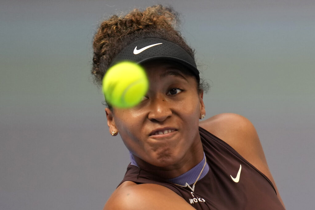 Japan's Naomi Osaka eyes a ball from Italy's Lucia Bronzetti during the China Open tennis tournament held at the National Tennis Center in Beijing, Wednesday, Sept. 25, 2024. (AP Photo/Ng Han Guan)