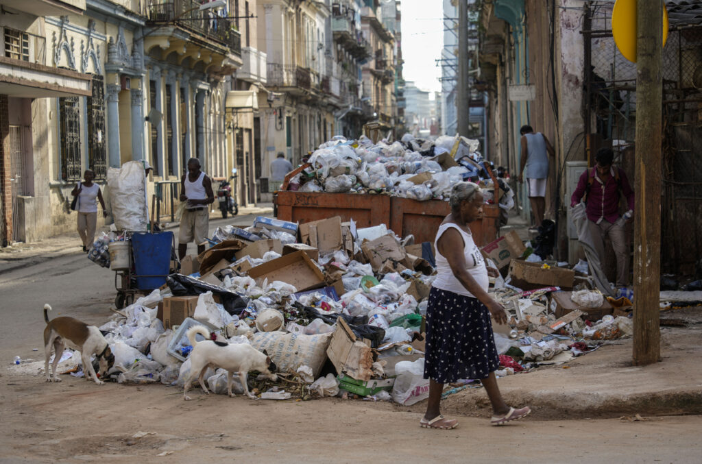 Garbage piles up on a corner in Havana, Cuba, Tuesday, Sept. 24, 2024. (AP Photo/Ramon Espinosa)