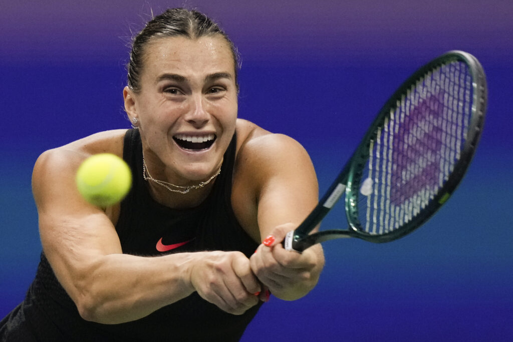 Aryna Sabalenka, of Belarus, returns a shot to Emma Navarro, of the United States, during the women's singles semifinals of the U.S. Open tennis championships, Thursday, Sept. 5, 2024, in New York. (AP Photo/Frank Franklin II)