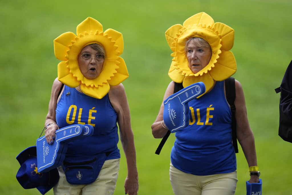 Fans are seen during a Solheim Cup golf tournament foursomes match at Robert Trent Jones Golf Club, Friday, Sept. 13, 2024, in Gainesville, Va. (AP Photo/Chris Szagola)