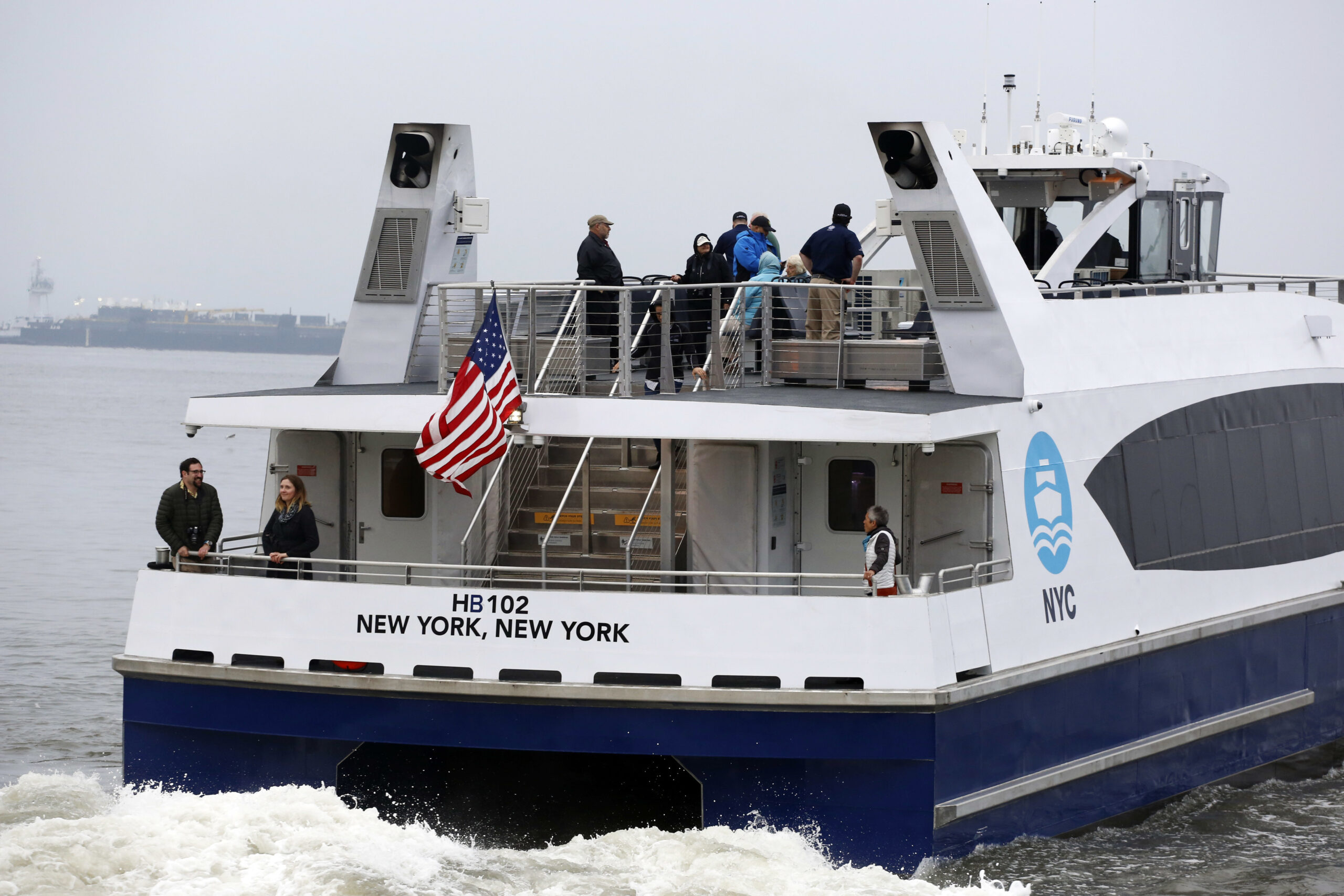 Passengers on board a NYC Ferry watch as the boat departs Sunset Park for Rockaway, Queens, Monday, May 1, 2017. AP Photo/Mark Lennihan