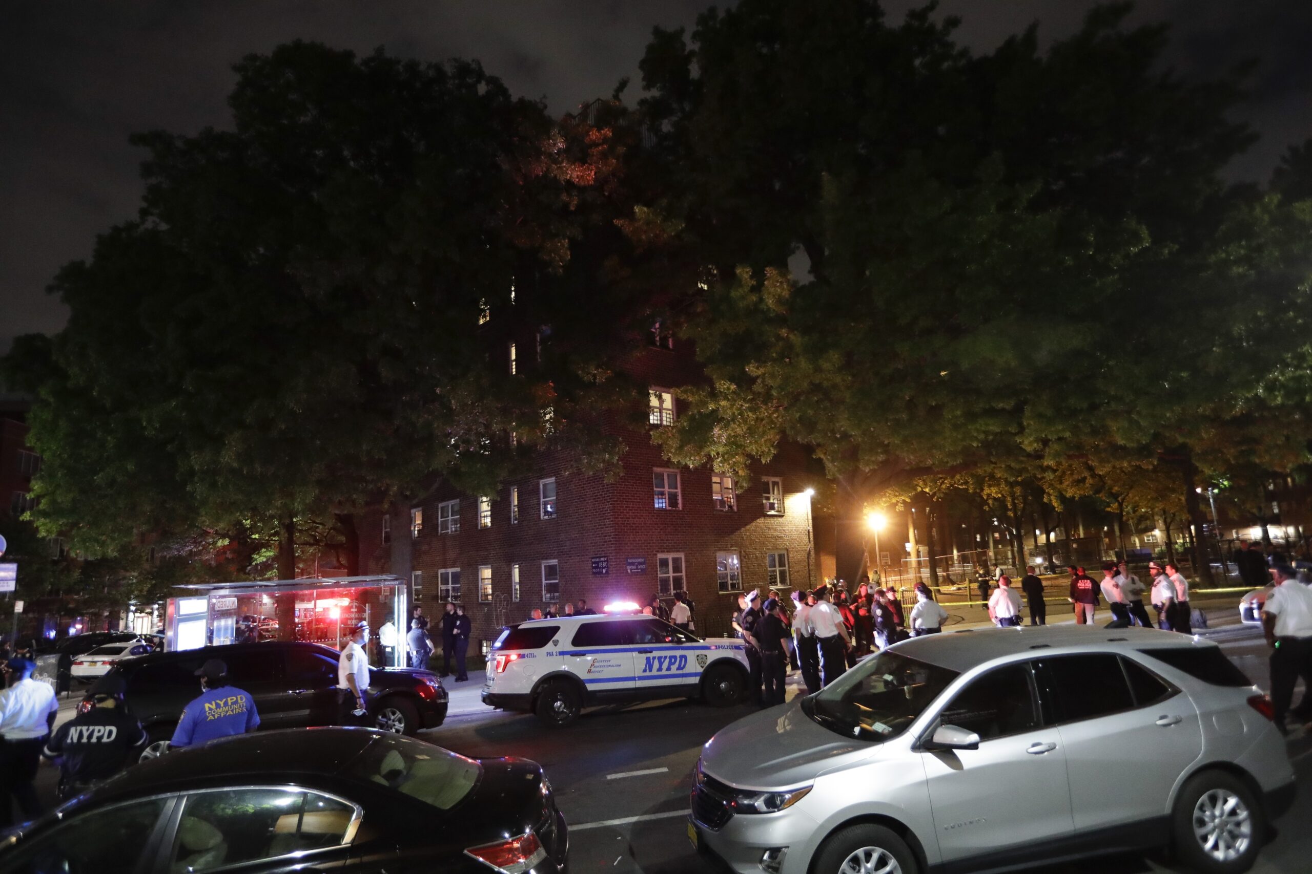 New York police officers gather at the scene of a fatal shooting in June 2020. Photo: Frank Franklin II/AP