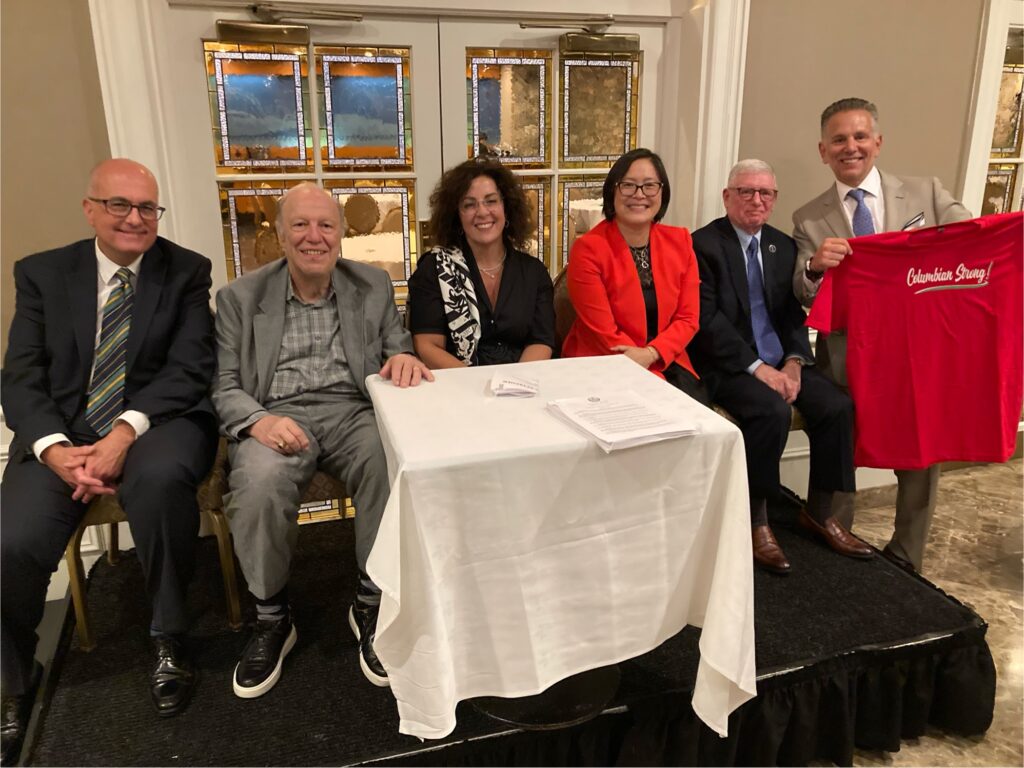 From left to right: Hon. Carl Landicino, Hon. Robert Miller, Hon. Lara Genovesi, Hon. Lillian Wan, Hon. William Mastro and Columbian Lawyers Association of Brooklyn President John Dalli, who gave the judges "Columbian Strong" t-shirts as a thank-you for stepping in at the last minute to lead a discussion on appellate practice. The judges provided practical advice and shared insights into how attorneys can better prepare for their cases before the Appellate Division, Second Department. Brooklyn Eagle photo by Robert Abruzzese