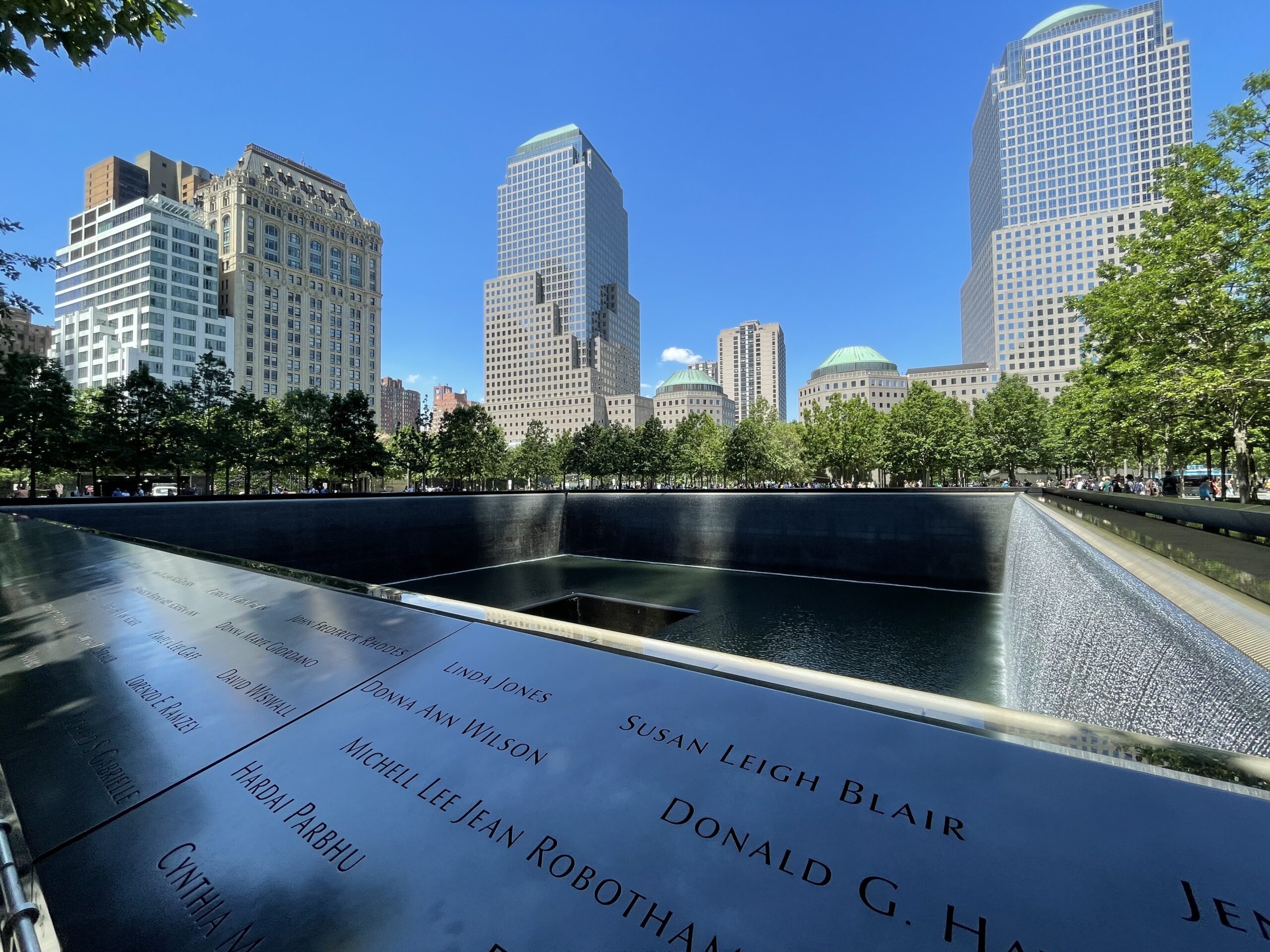 The Memorial Pools, showing names engraved on 3,900 granite panels framing the structure, have the largest man-made waterfalls in North America. Brooklyn Eagle Photo by Francesca N. Tate