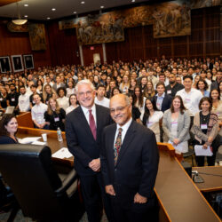 Dean David Meyer and Judge Ramon Reyes Jr. '92 stand at the podium in the ceremonial courtroom of the U.S. District Court for the Eastern District of New York, addressing more than 400 new Brooklyn Law School students during the 2024 Convocation. Behind them, the incoming class listens, marking the beginning of their legal journey. Photos courtesy of Brooklyn Law School