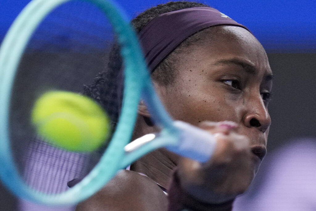 Coco Gauff of the United States returns a forehand shot to Yuliia Starodubtseva of Ukraine during the women's singles quarterfinals match of the China Open tennis tournament, at the National Tennis Center in Beijing, Thursday, Oct. 3, 2024. (AP Photo/Andy Wong)