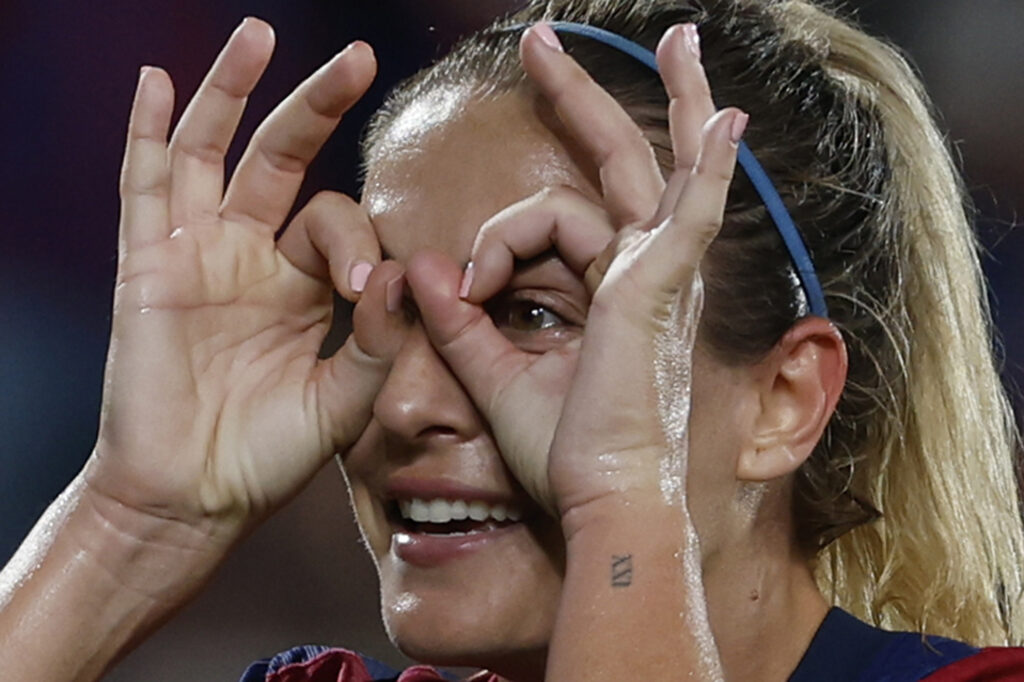 Barcelona's Alexia Putellas celebrates after scoring her side's third goal during the women's Champions League group D soccer match between Barcelona and Hammarby at the Estadi Johan Cruyff in Barcelona, Wednesday, Oct. 16, 2024. (AP Photo/Joan Monfort)