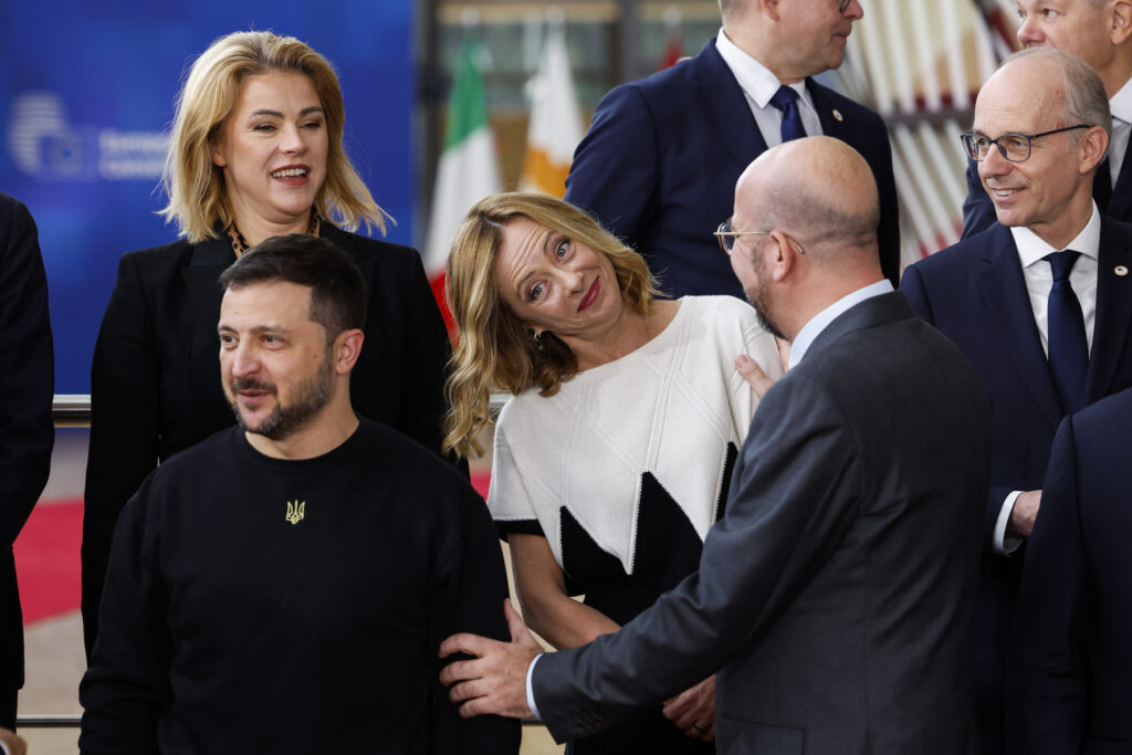 European Council President Charles Michel, second right, talks to Italy's Prime Minister Giorgia Meloni, center, next to Ukraine's President Volodymyr Zelenskyy, bottom left, as they arrive for a group photo during an EU summit in Brussels, Thursday, Oct. 17, 2024. (AP Photo/Geert Vanden Wijngaert)