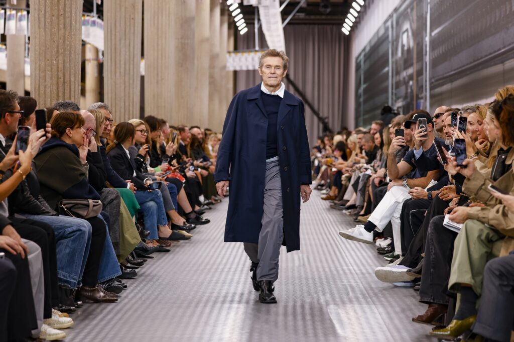 Willem Dafoe wears a creation as part of the Miu Miu Spring/Summer 2025 collection presented Tuesday, Oct. 1, 2024, in Paris. (Photo by Vianney Le Caer/Invision/AP)