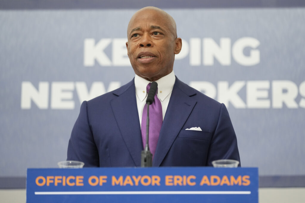 New York City Mayor Eric Adams speaks to reporters after a news conference in New York, Monday, Sept. 30, 2024. AP Photo/Seth Wenig