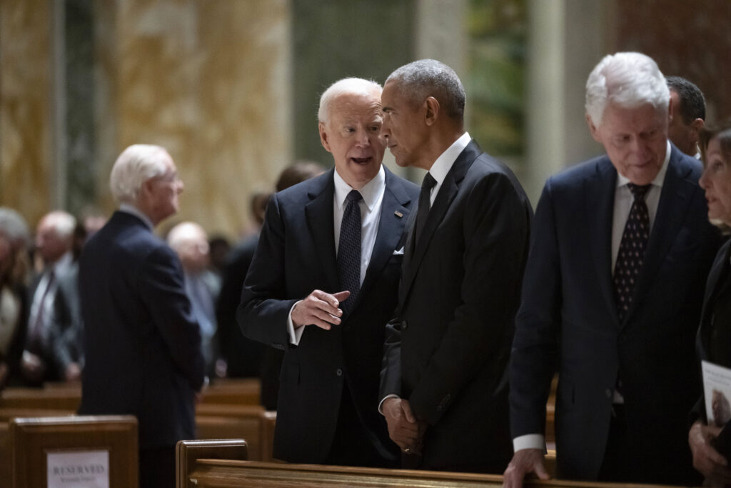 President Joe Biden, left, and former Presidents Barack Obama, center, and Bill Clinton, right, attend a memorial service for Ethel Kennedy, the wife of Sen. Robert F. Kennedy, who died Oct. 10, 2024 at age 96, at the Cathedral of St. Matthew the Apostle in Washington, Wednesday, Oct. 16, 2024. (AP Photo/Ben Curtis)