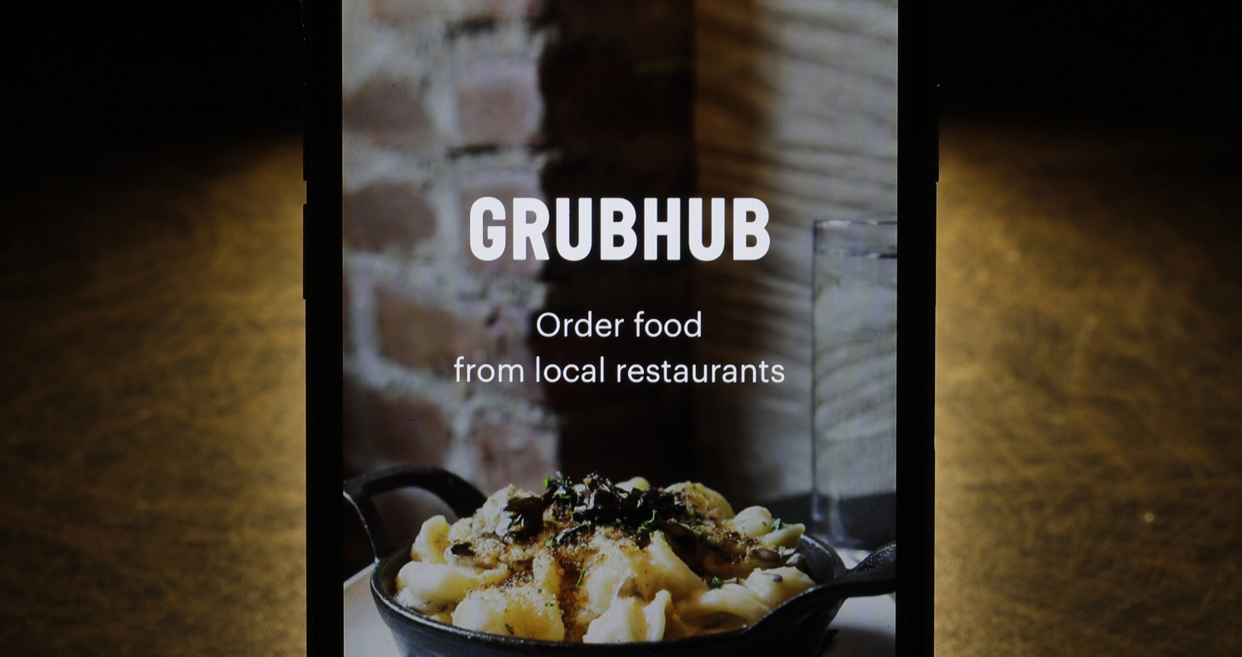 he Grubhub app is seen on an iPhone, Feb. 20, 2018. AP Photo/Charles Rex Arbogast, File