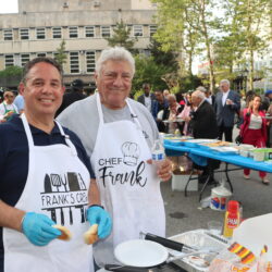 Joseph Rosato (left) and Hon. Frank Seddio at their Brooklyn Supreme Court BBQ, where the duo served up food and camaraderie for the legal community. Brooklyn Eagle photo by Mario Belluomo