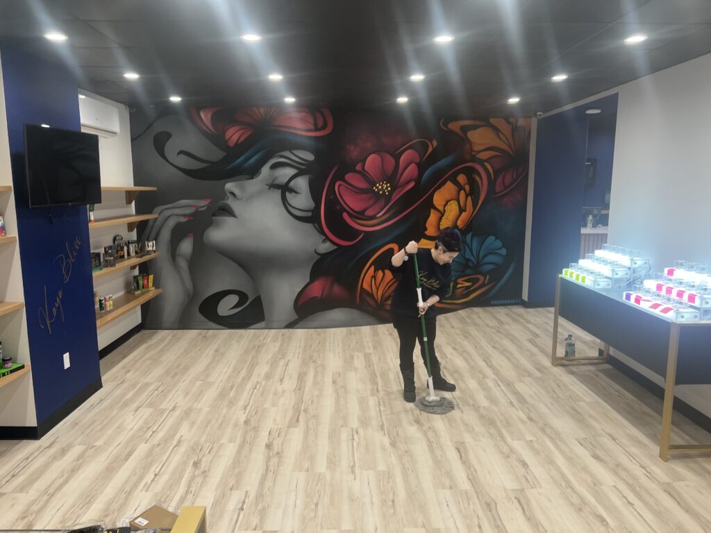 Kat Santomoreno preparing for Kaya Bliss’ soft opening. Photo by Wayne Daren Schneiderman