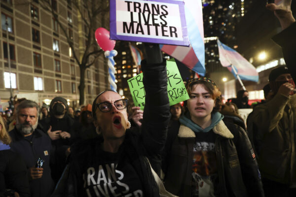 Protesters march during a rally demanding that NYU Langone commit to providing gender-affirming care for transgender youth following an executive order by President Donald Trump aimed at cutting federal funding, Monday, Feb. 3, 2025, in New York. AP Photo/Heather Khalifa